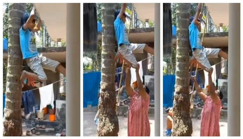 video of a child who tried to climb on top of his house but failed has gone viral 