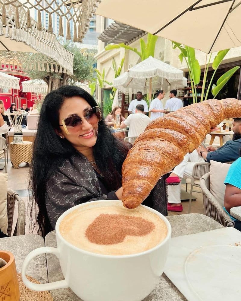 Vijayalakshmi Darshan enjoys her big mug coffee and giant croissant pav 