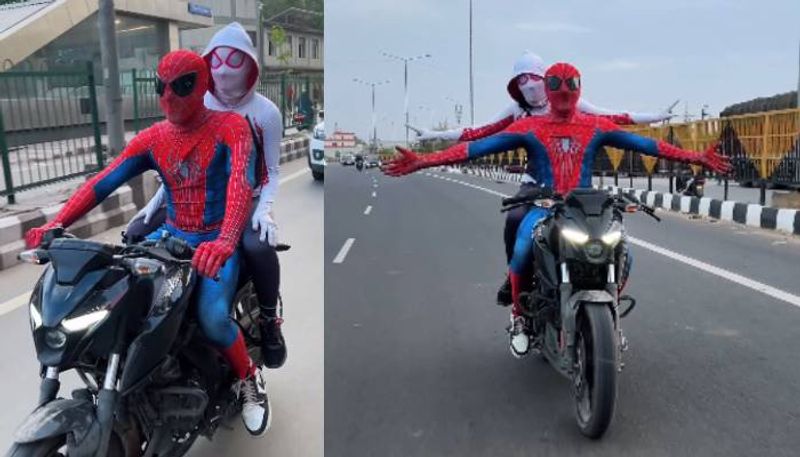 spiderman and spiderwoman bike ride arrested in delhi