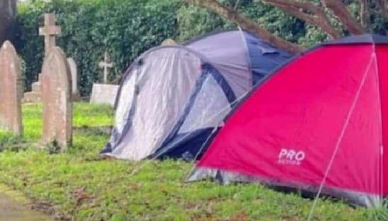 Camborne in Cornwall uk town people sleeping in tents and graveyards 