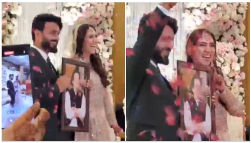 Groom surprise gift to bride on wedding day un packed in stage viral video