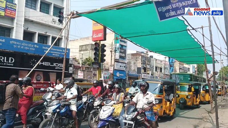 Temporary roof at key signal to save motorists from heat in Madurai vel