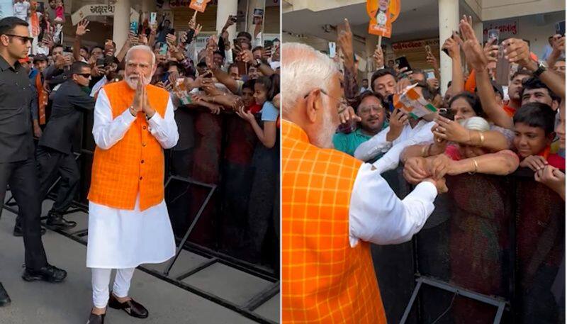 Narendra Modi speak after voting in Gujarat nbn