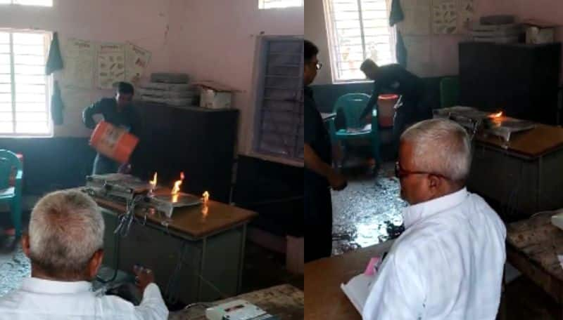 Maharashtra loksabha elections 2024 youngster set fire on evm machine video went viral ans