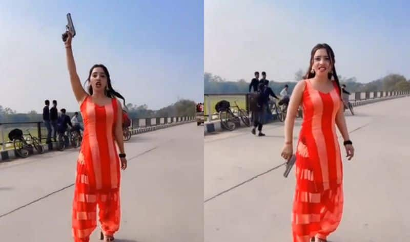 Video of girl openly waving gun on Lucknow highway for Instagram reel goes viral vvk