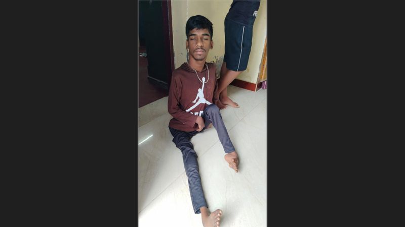 physically challenged student scored 420 marks who wrote 10th public exam in tirunelveli vel