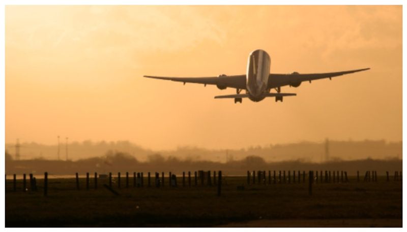 Woman sick leave takes a hilarious turn as she runs into her boss on same flight AJR