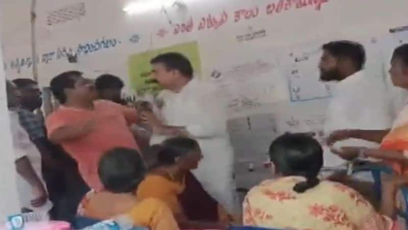 YSRCP MLA and candidate Sivakumar attacks a voter who asked to come in queue  smp