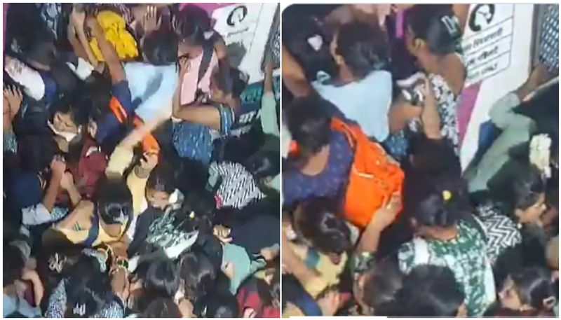 Shocking video Hundreds of women struggling to enter train compartment hardly had any space