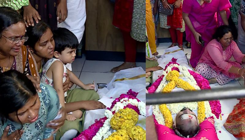 Protest in front of Air India office against air india express with dead body of Nambi Rajesh