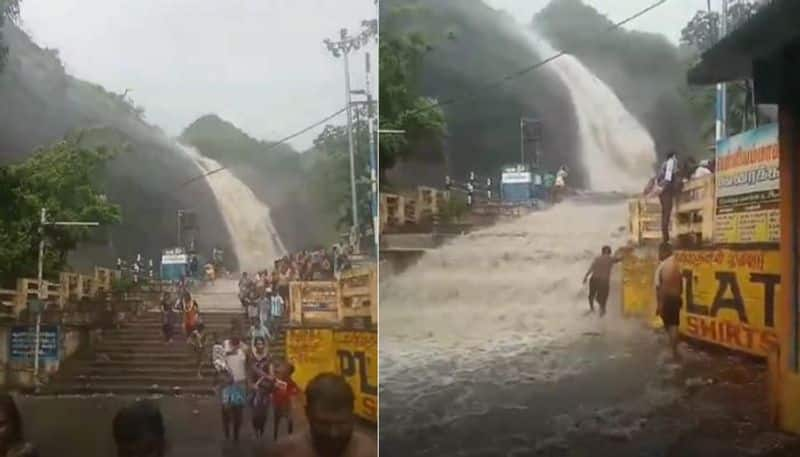 watch flashflood at the Old Courtrallam waterfall mrq