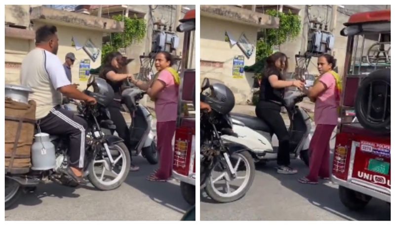 video of a woman holding a girl in the middle of the road on her way to meet her son goes viral 