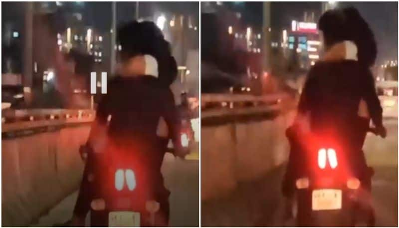 The journey of the young man with the young woman on his lap through the flyover; The police found both of them, the incident happened in Bengaluru