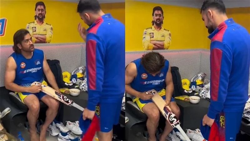 CSK talisman MS Dhoni giving autograph to RCB Player Mayank Dagar Bat san