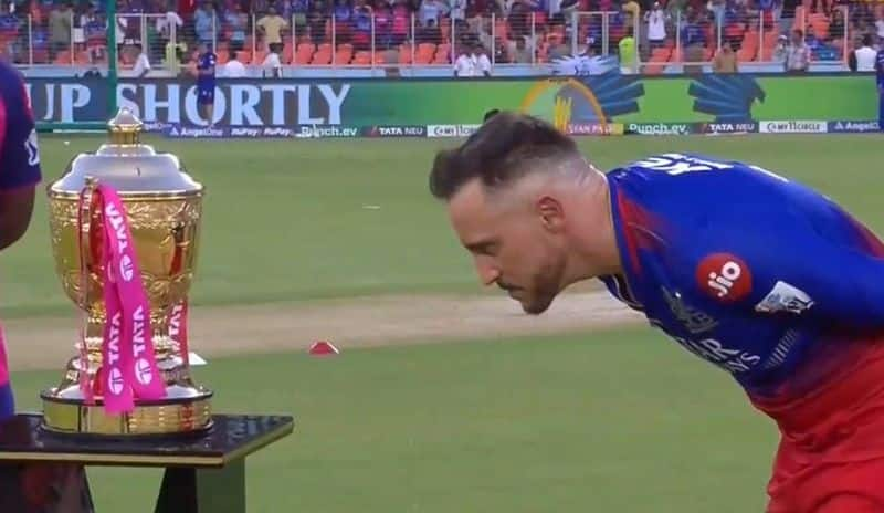 Faf du Plessis Touch the IPL 2024 Trophy during RR vs RCB in Eliminator Match Toss at Ahmedabad rsk