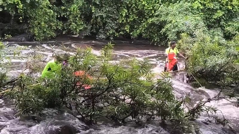 village people rescued by fire and safety department officers who stuck flash flood in theni district vel