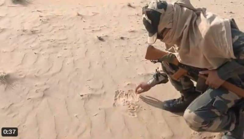 video shows bsf jawan roasts papad on scorching sand 