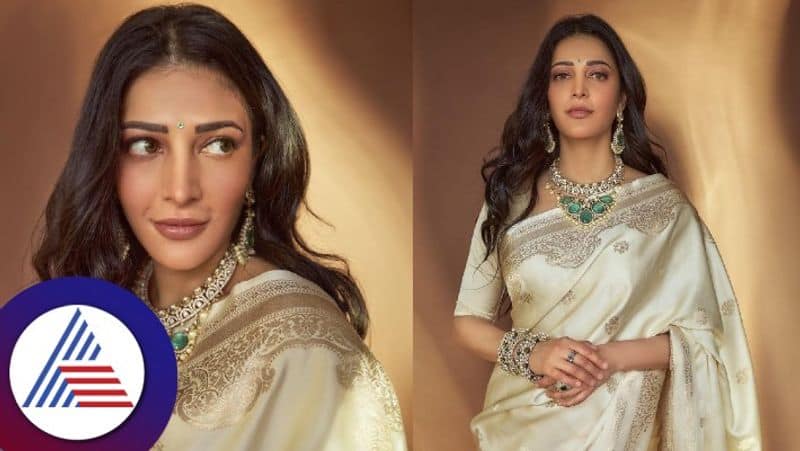 Actress Shruti Haasan Looks ethereal in Cream Saree With Heavy Traditional Accessories gvd