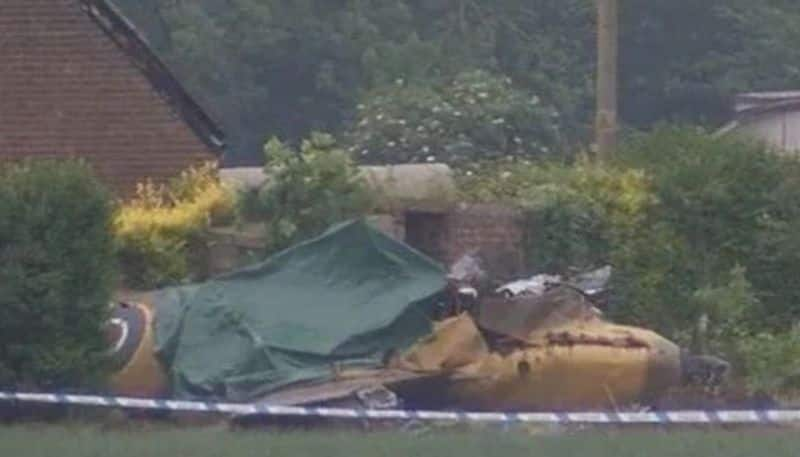 pilot has died after a Spitfire crashed in a field close to an RAF station in Lincolnshire