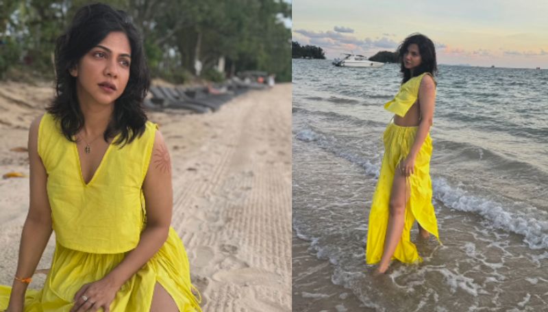 Actress Madonna Sebastian hot pose in beach video viral in social media ans