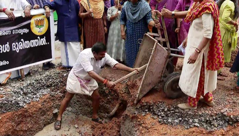 Kerala: BJP protests over delayed road construction under Smart City by filling potholes in Thiruvananthapuram anr