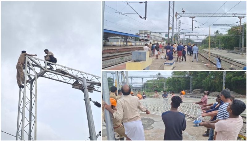 mans suicide threat on electric tower inside railway station