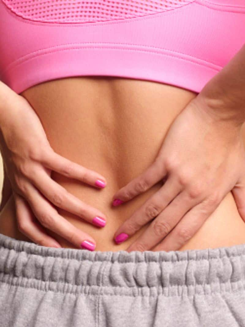 six reasons behind back pain in women