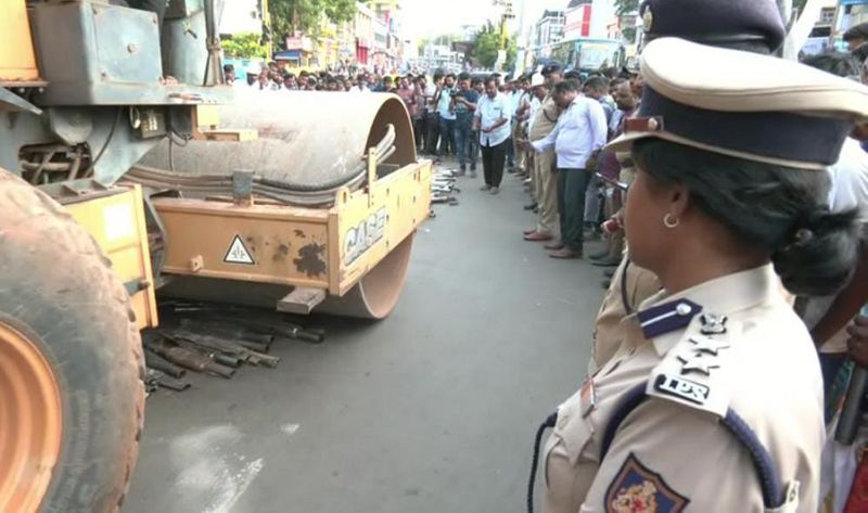 dharwad police destroyed the noisy bike silencer with a bulldozer gvd