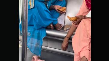 Watch: Women eat samosas on Delhi metro, discard waste under seat; Internet reacts RTM