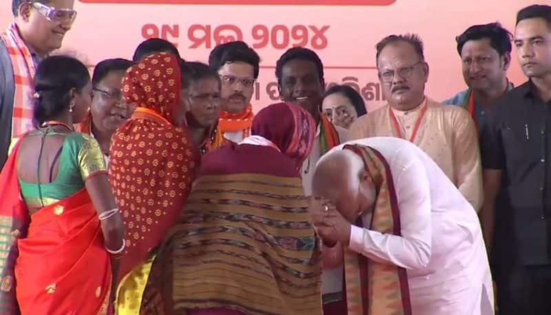 PM Modi bows down to woman who turns 'waste to wealth' at election rally in Odisha; WATCH viral moment