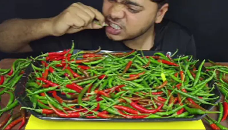 Food Vlogger Eats Plate Full Of Raw Chillies