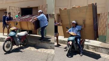 Viral Video: Brazilian Man Balances Massive Almirah on Scooter, Amuses Internet [WATCH] NTI