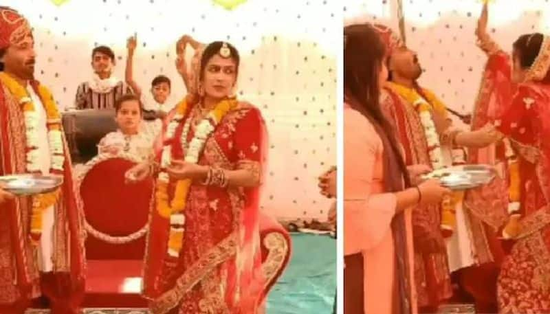 bride slap groom who is not eating rasgulla