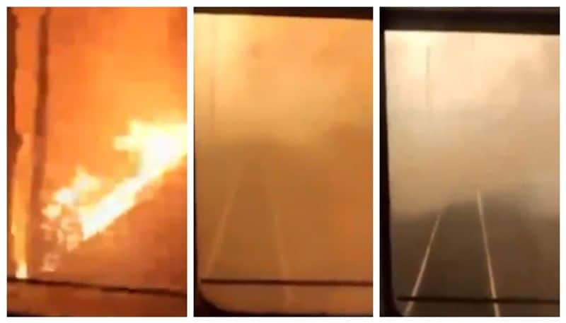 A video of a train passing through a forest fire in Russia has gone viral