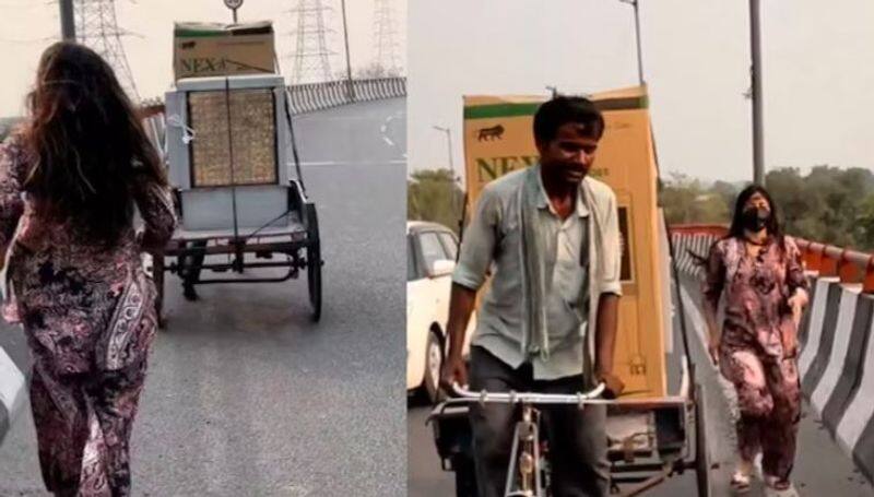 Woman Helps Rickshaw Puller Carrying Heavy Goods On Flyover, Internet Reacts Vin