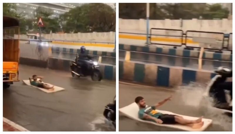 Social media reacts sharply to a man by surfing in waterlogged areas of the road