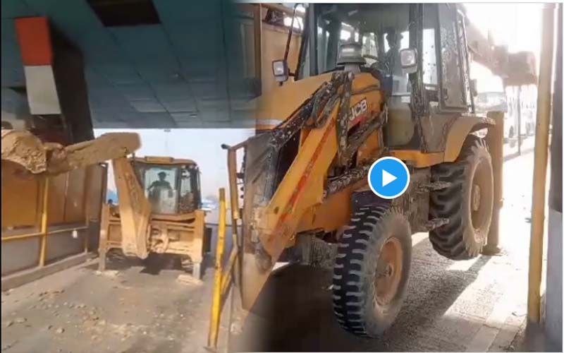 JCB driver refuses to pay toll and destroys toll booth in UP