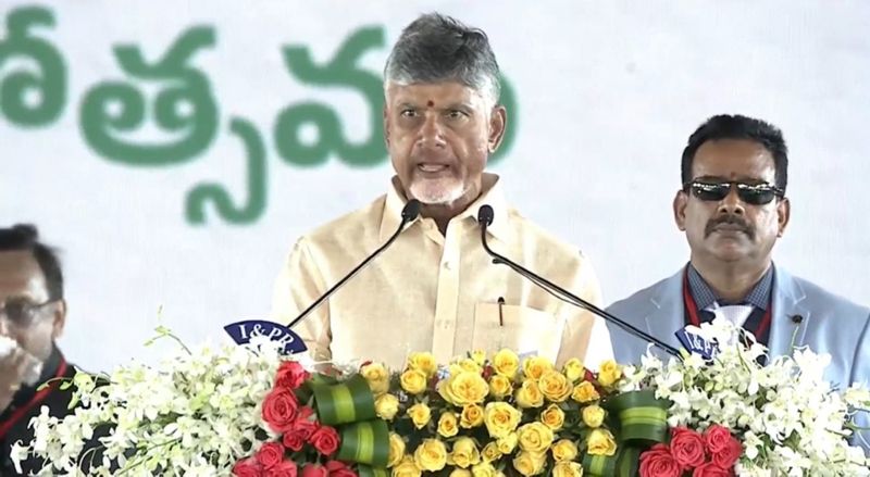 Chandra babu Naidu tries touching PM Modi's feet after taking oath as AP CM