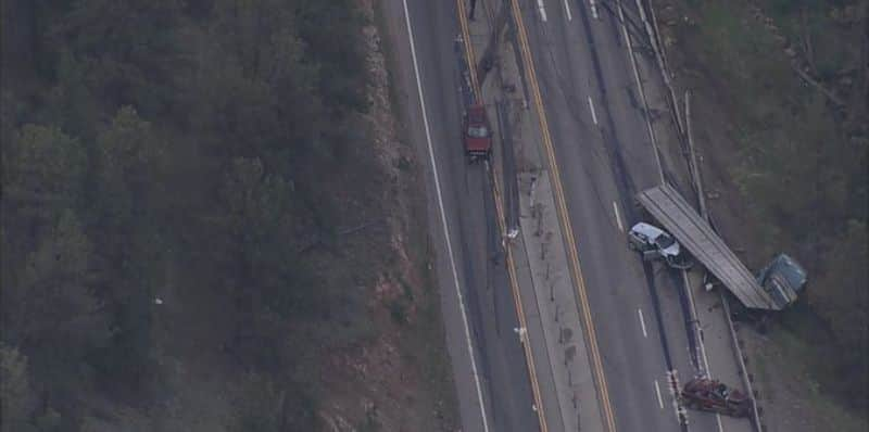 truck veered of the edge of the road spills pipes and iron onto other vehicles kills 1 in Highway 285