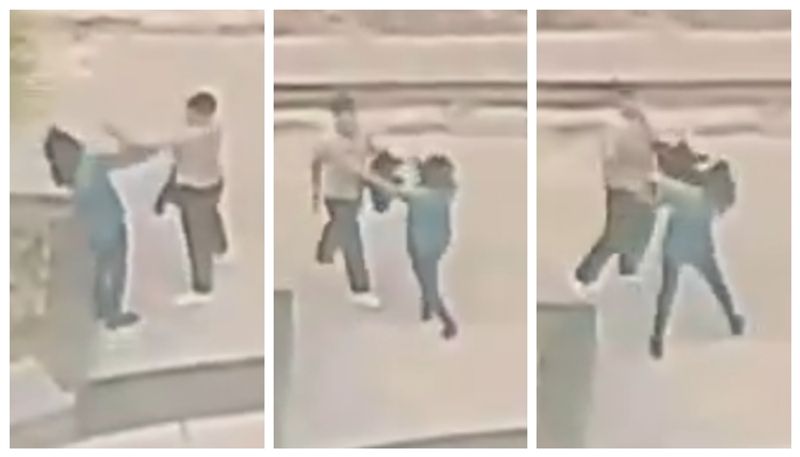 video of a man slapping a young woman on the face of the university campus in Noida has gone viral