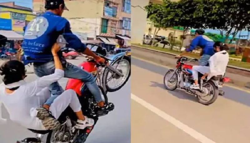 no helmet couple bike stunt went viral 