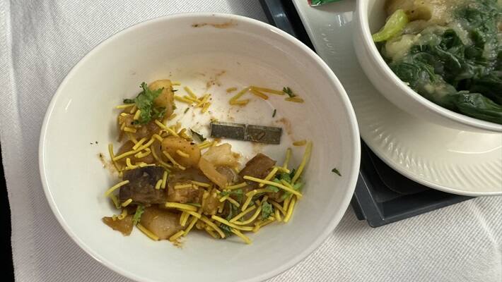 Air India Passenger found metal in his flight meal Airline offers one free business class ticket ckm