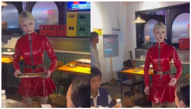 video of waitress serving food at chinese restaurant goes viral