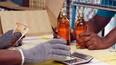 Employee suspended for buying extra Rs 10 for a bottle of liquor at a Tasmac shop KAK