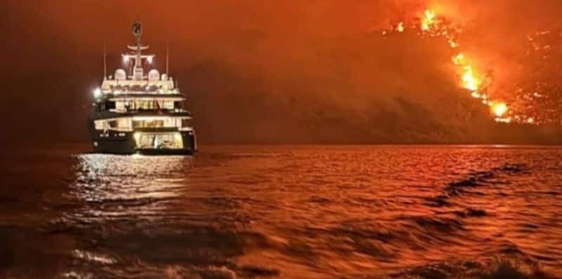 fire works from luxury yacht cause forest fire in Greece 13 arrested 