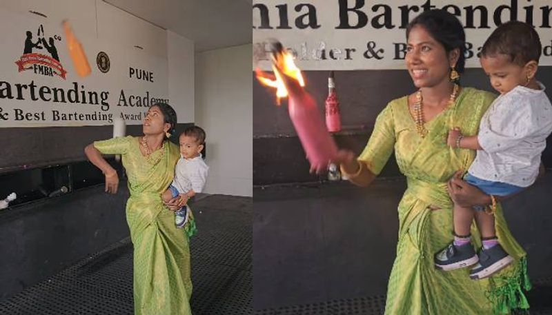 woman bartender juggles glass bottle with holding baby video 