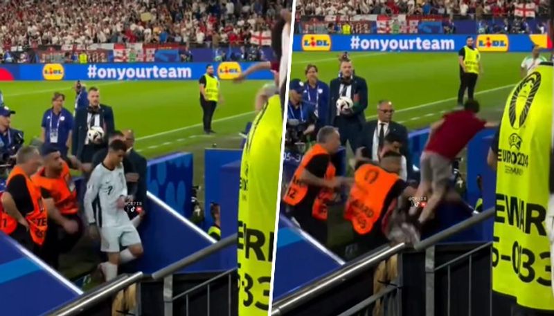 football Cristiano Ronaldo avoids being kicked by fan who leapt from stands after Portugal's Euro 2024 defeat (WATCH) snt