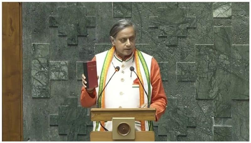 Shashi Tharoor takes oath in Lok Sabha