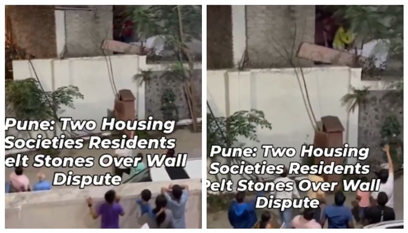 Members of two housing societies throw stones at each other into houses