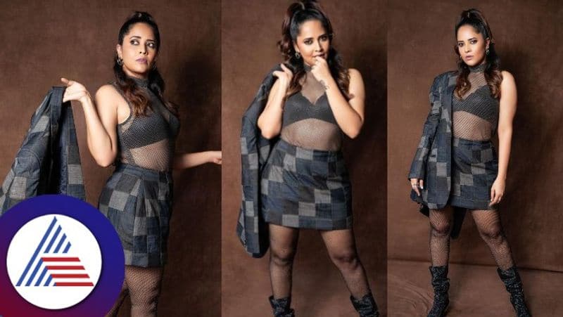 netizens bad comments on pushpa actress anasuya bharadwaj boss lady look pics gvd